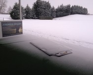 golf lesson milton keynes driving range mat in snow