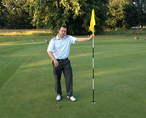 Andrew providing a golf playing lesson